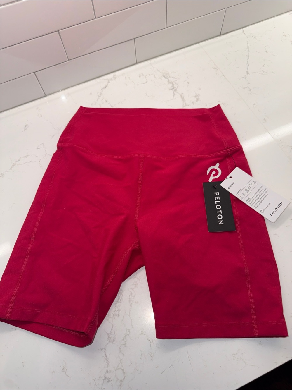 Peloton Women's 
Cadent High Rise Pocket Bike Short 7"